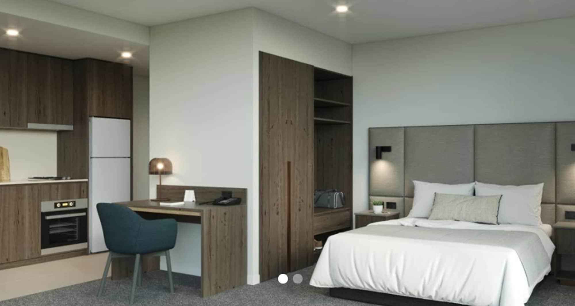 オークウッド プレミア メルボルンアパートホテル エクステリア 写真 A typical bedroom at the hotel