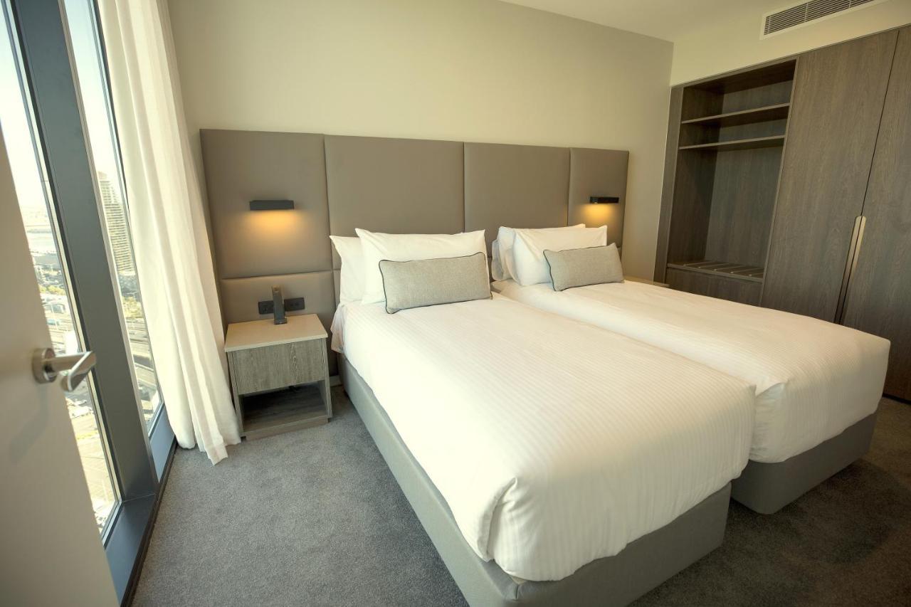オークウッド プレミア メルボルンアパートホテル エクステリア 写真 A bedroom at the hotel